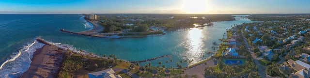 aerial view at dusk with a water view