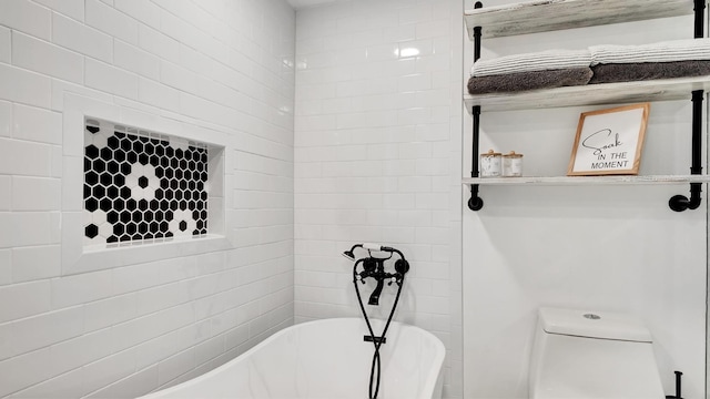 bathroom with a tub to relax in