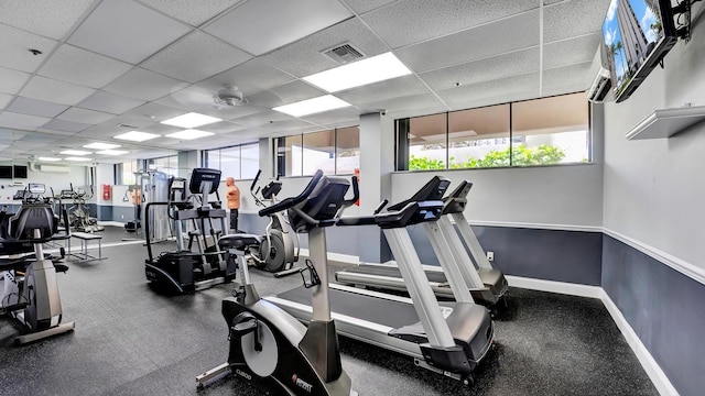 gym with a drop ceiling