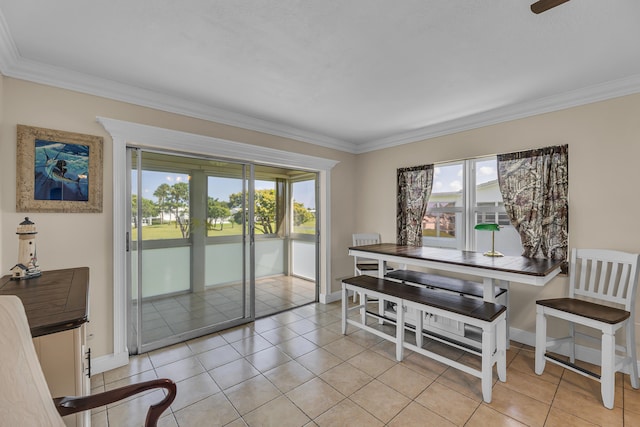 tiled dining area with crown molding