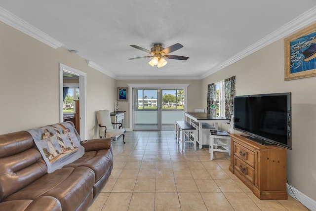 living room featuring ceiling fan, light tile patterned floors, and crown molding