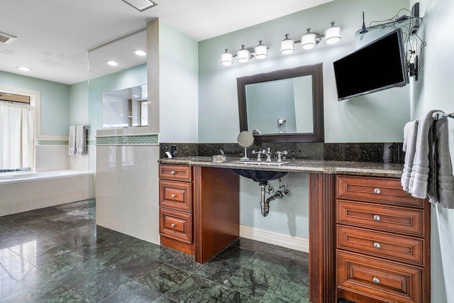 full bath with tiled bath, visible vents, and recessed lighting