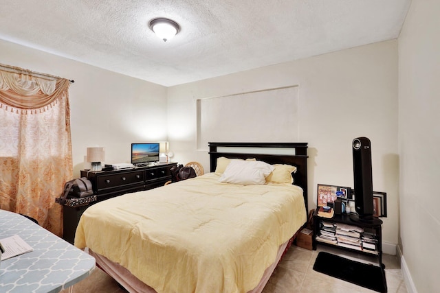 bedroom with a textured ceiling