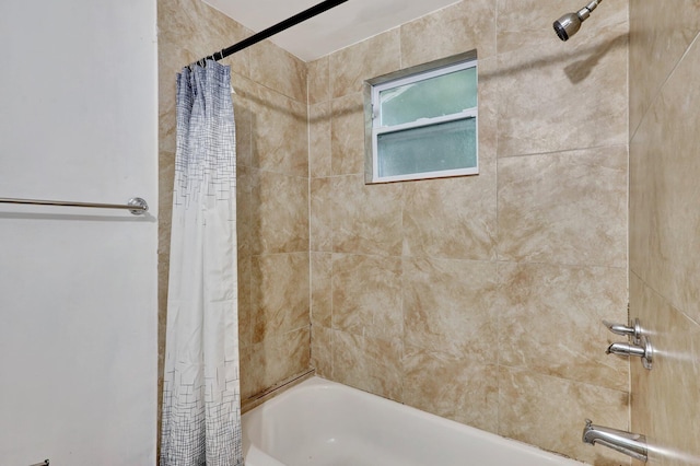 bathroom featuring shower / bath combination with curtain