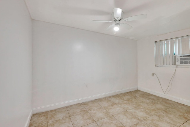 unfurnished room featuring ceiling fan, cooling unit, and light tile patterned flooring