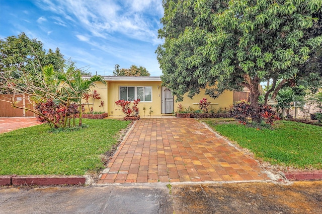 view of front of house with a front yard