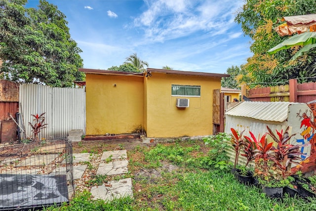 exterior space with an AC wall unit