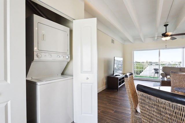 laundry area with stacked washing maching and dryer and ceiling fan