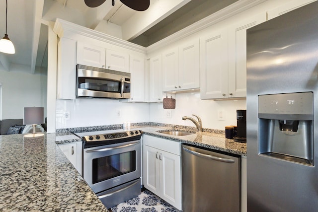 kitchen featuring white cabinetry, sink, and stainless steel appliances