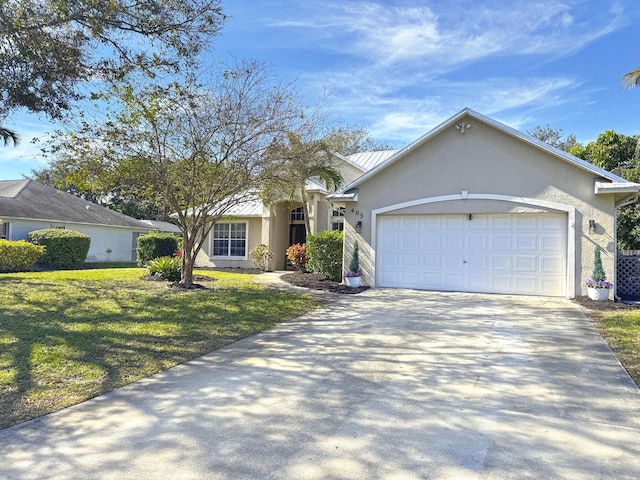 ranch-style home featuring a garage and a front lawn