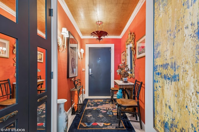 interior space with ornamental molding and french doors