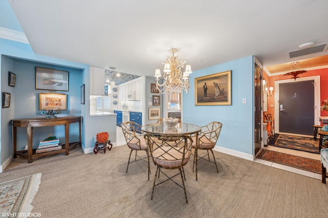 dining space with light carpet, ornamental molding, and a notable chandelier