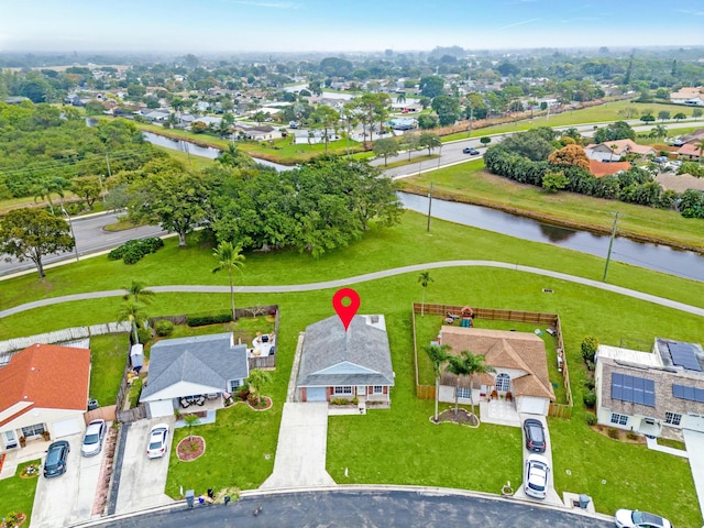 drone / aerial view featuring a water view