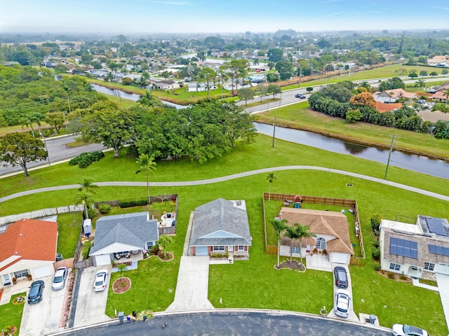 bird's eye view with a water view