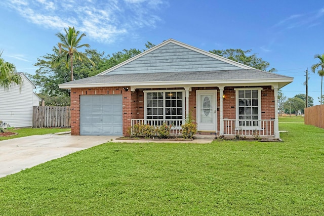 view of front of property with covered porch, a garage, and a front lawn