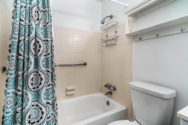 bathroom with toilet and shower / bath combo with shower curtain