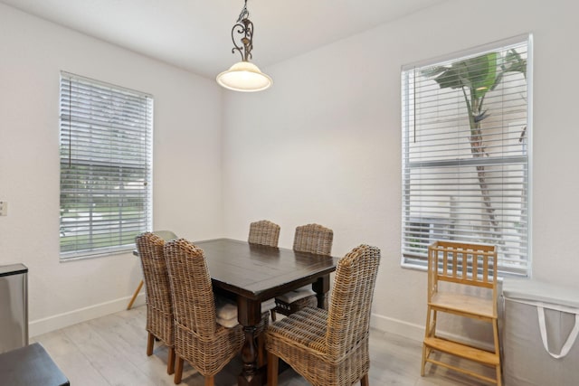 dining room featuring light wood-type flooring