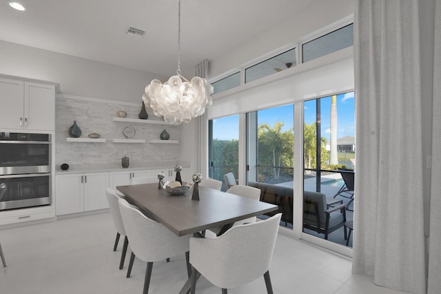 dining room with a chandelier