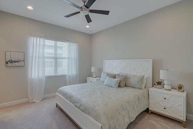 carpeted bedroom with ceiling fan