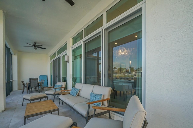 exterior space featuring ceiling fan and outdoor lounge area