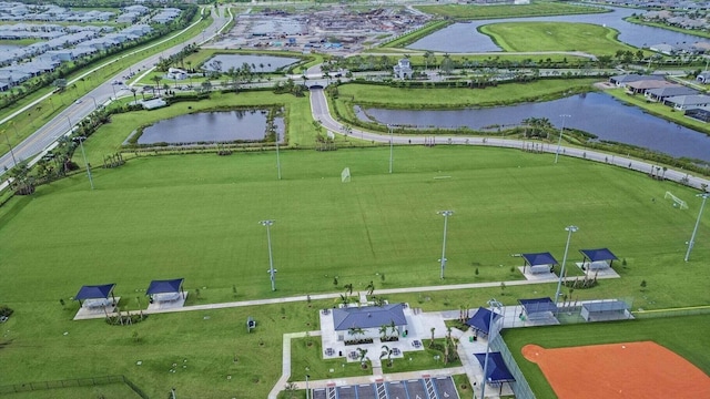 birds eye view of property featuring a water view