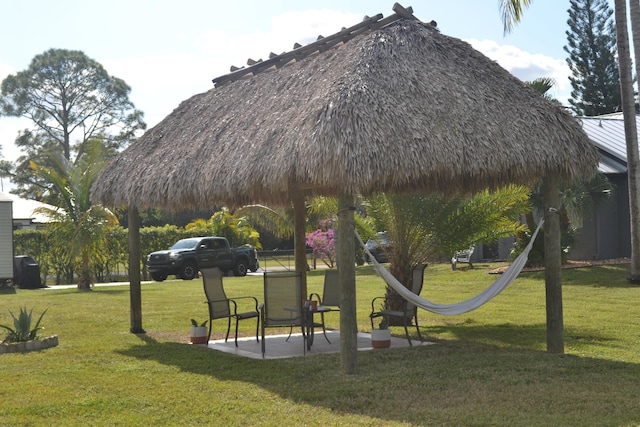 view of home's community featuring a gazebo and a yard