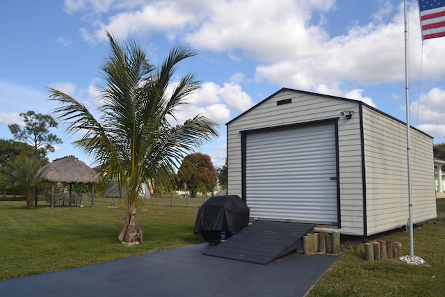 garage with a lawn