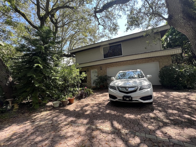 view of front of property with a garage