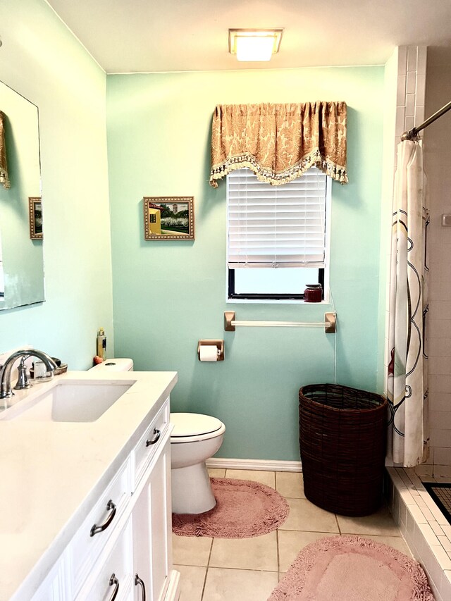 carpeted bedroom with a tray ceiling, ceiling fan, and a textured ceiling