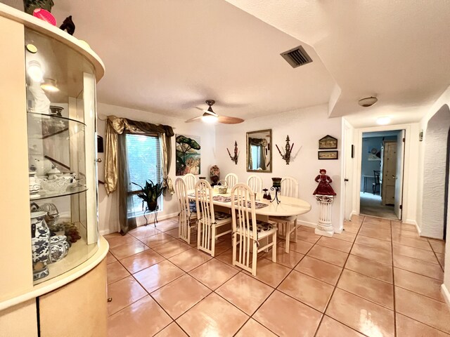 misc room featuring tile patterned flooring and a textured ceiling