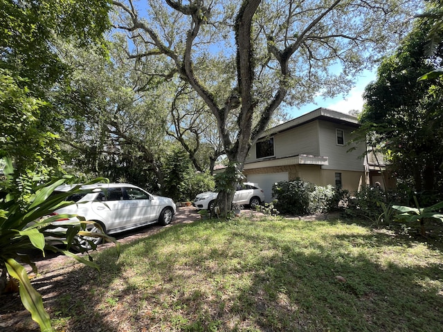 view of yard with a garage