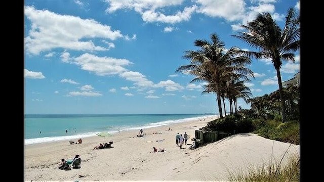 property view of water with a beach view