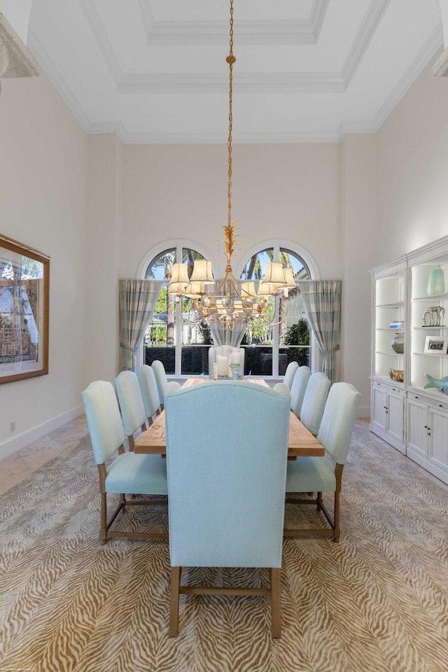 dining area featuring a high ceiling, light colored carpet, and a notable chandelier