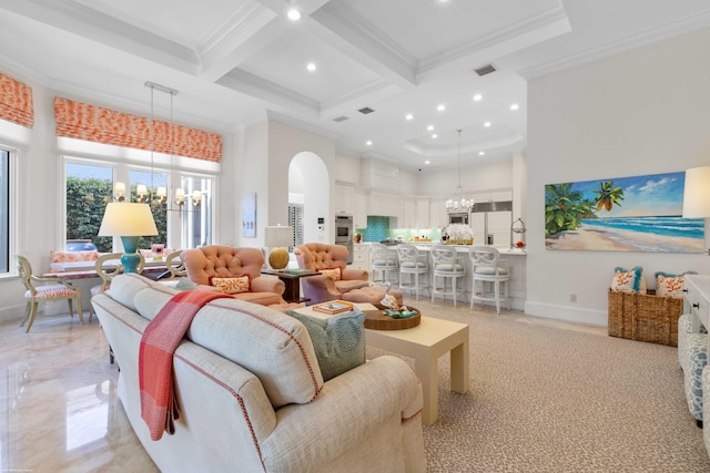 living room with beam ceiling, ornamental molding, coffered ceiling, and an inviting chandelier