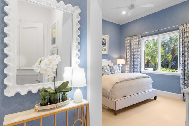 bedroom featuring ceiling fan and ornamental molding