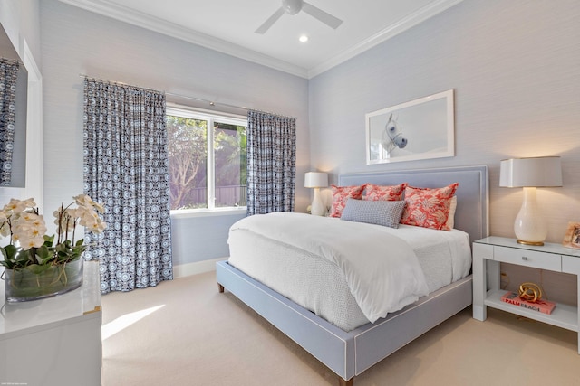 bedroom with light carpet, ceiling fan, and crown molding