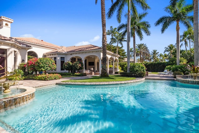 view of pool featuring a patio area and pool water feature