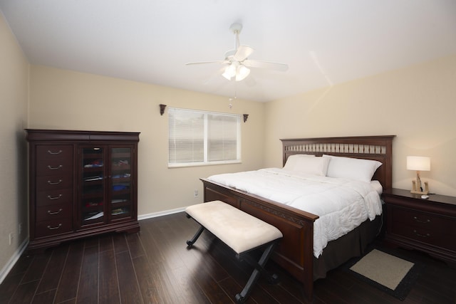 bedroom with dark wood-type flooring and ceiling fan