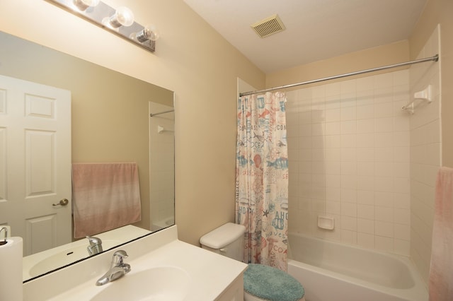 full bathroom featuring toilet, vanity, and shower / bath combination with curtain