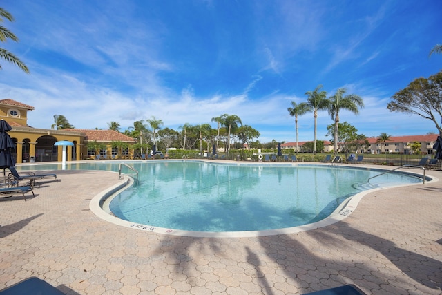 view of pool featuring a patio area