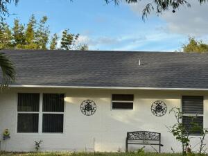 view of home's exterior with a lawn