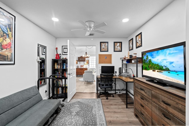 office area with ceiling fan and light wood-type flooring