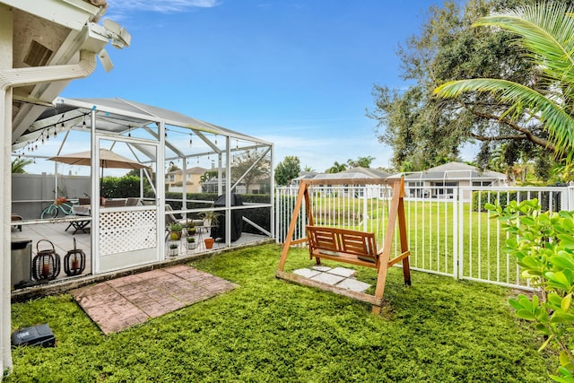 view of yard with a lanai and a patio