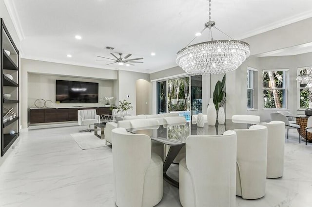 dining area with crown molding, plenty of natural light, and ceiling fan