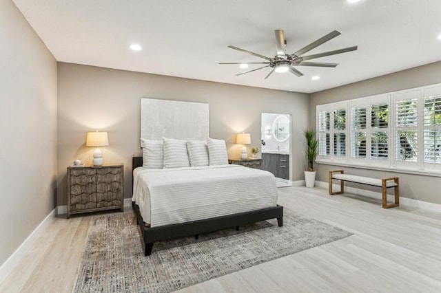 bedroom featuring ceiling fan and light hardwood / wood-style flooring