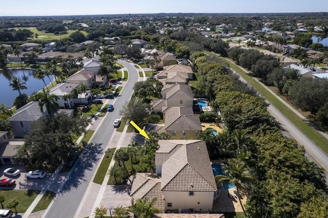 drone / aerial view featuring a water view