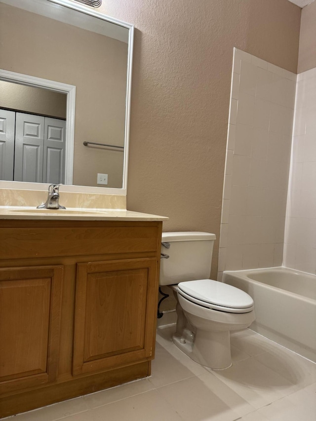 full bathroom with tile patterned flooring, vanity, toilet, and bathtub / shower combination