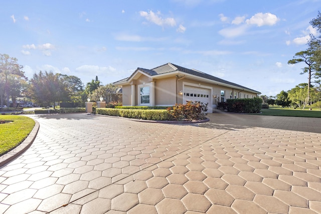 view of front of home featuring a garage