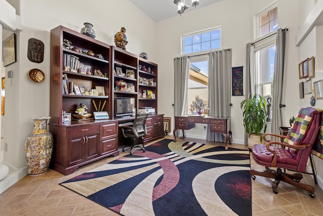 home office with a towering ceiling