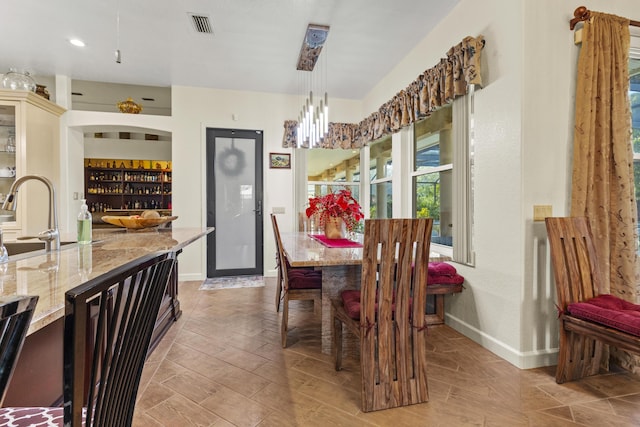 dining space with sink